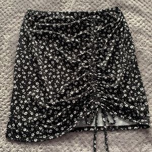 Floral mini skirt with ruching